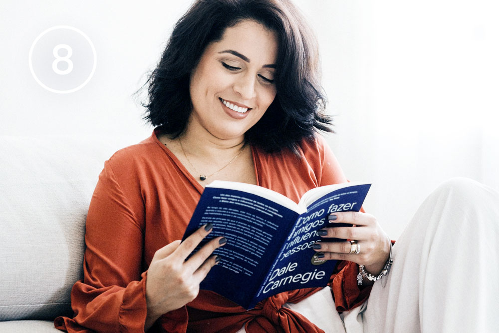 a middle-aged woman staying active by reading book